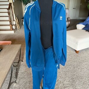 Navy blue Adidas originals track suit